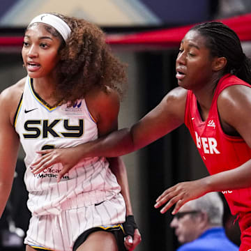 May 17, 2025; Indianapolis, IN, USA;  Chicago Sky forward Angel Reese (5) reacts to a flagrant foul from Indiana Fever guard Caitlin Clark (22) on Saturday, May 17, 2025, during a game between the Indiana Fever and the Chicago Sky at Gainbridge Fieldhouse in Indianapolis. The Indiana Fever defeated the Chicago Sky, 93-58.Mandatory Credit: Grace Smith-IndyStar via Imagn Images