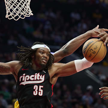 Feb 20, 2025; Portland, Oregon, USA; Portland Trail Blazers center Robert Williams III (35) grabs a rebound during the second half against the Los Angeles Lakers at Moda Center. Mandatory Credit: Troy Wayrynen-Imagn Images