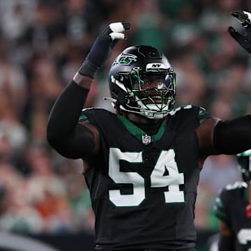 Oct 31, 2024; East Rutherford, New Jersey, USA; New York Jets defensive tackle Javon Kinlaw (54) reacts during the first half of their game against the Houston Texans at MetLife Stadium. Mandatory Credit: Ed Mulholland-Imagn Images