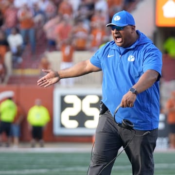 BYU Cougars head coach Kalani Sitake celebrates after the Cougars stopped the Texas Longhorns in the red zone in the fourth quarter at Royal-Memorial Stadium on Saturday October 28, 2023.