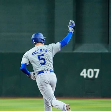 Los Angeles Dodgers Freddie Freeman (5) hits a two-run home run off Arizona Diamondbacks pitcher Slade Cecconi (43) in the eighth inning at Chase Field on Sept. 2, 2024, in Phoenix.