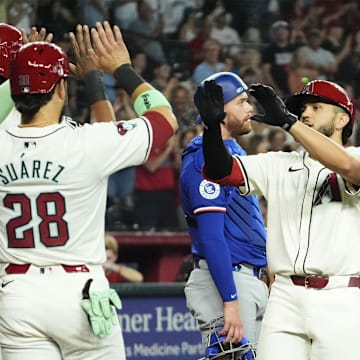 Arizona Diamondbacks Adrian Del Castillo (25) reacts after hitting a three-run home run against the Texas Rangers in the fifth inning at Chase Field in Phoenix on Sept. 11, 2024.