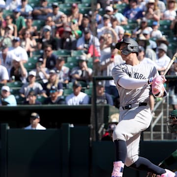 New York Yankees designated hitter Aaron Judge (99) hits an RBI ground out against the Athletics during the ninth inning at Sutter Health Park on May 10.