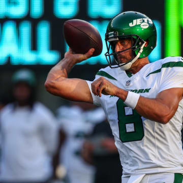 Aug 26, 2023; East Rutherford, New Jersey, USA; New York Jets quarterback Aaron Rodgers (8) throws a pass  against the New York Giants during the first half at MetLife Stadium. Mandatory Credit: Ed Mulholland-USA TODAY Sports