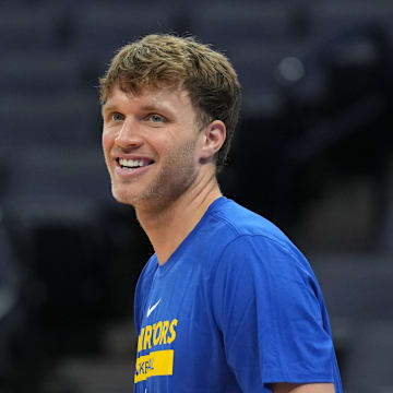 Jul 5, 2023; Sacramento, CA, USA; Golden State Warriors center Jayce Johnson (36) warms up before the game against the Charlotte Hornets at Golden 1 Center. Mandatory Credit: Darren Yamashita-Imagn Images