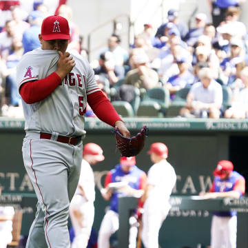 Apr 17, 2022; Arlington, Texas, USA; Los Angeles Angels starting pitcher Jose Suarez (54) walks off the field as he leaves the game in the fifth inning against the Texas Rangers at Globe Life Field. Mandatory Credit: Raymond Carlin III-USA TODAY Sports