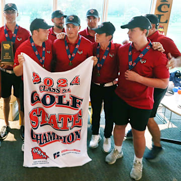 ADM boys golfers celebrate after winning the state 3A boys golf tournament at Veenker Golf Course on Tuesday, May 21, 2024, in Ames, Iowa.