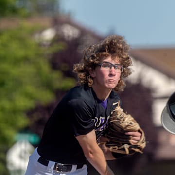 Tokay's Brock Sell's hat flies off as he delivers a pitch during a varsity baseball game at Lincoln in Stockton on Wednesday, Apr.19, 2023.

Bb Tokay Linc 017a