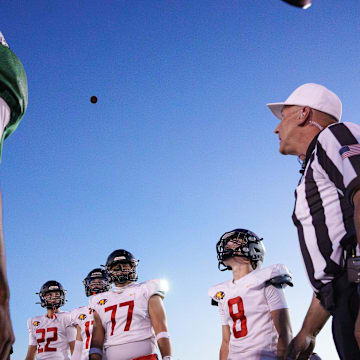 Chaparral and Saguaro captains come together for the coin toss before a Friday night football game at the Saguaro High School football field on Sept. 5, 2025, in Scottsdale.