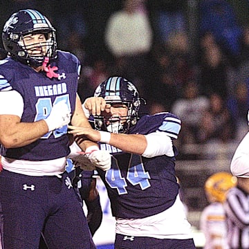Hoggard celebrates after they intercepted the ball as Hoggard took on Laney Oct. 17, 2025 in Wilmington, N.C. Hoggard beat Laney 28 to14. KEN BLEVINS/STARNEWS