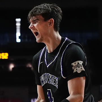 Waukee's forward Evan Jacobson (4) reacts after a score against Linn-Mar during the fourth quarter in the 4A IHSAA boys state basketball quarter-final at Wells Fargo Arena on Monday, March 10, 2025, in Des Moines, Iowa.
