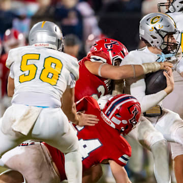 Calvary Baptist (white) is seeking its second state title in three years