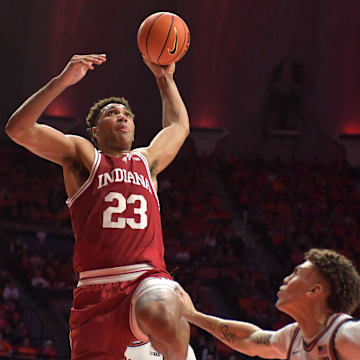 Indiana Hoosiers forward Trayce Jackson-Davis (23) goes to the basket over Illinois Fighting Illini forward Coleman Hawkins (33) during the second half at State Farm Center.