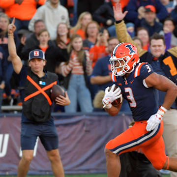 Oct 21, 2023; Champaign, Illinois, USA;  Illinois Fighting Illini running back Kaden Feagin (3) scores a touchdown during the second half against the Wisconsin Badgers at Memorial Stadium. Mandatory Credit: Ron Johnson-Imagn Images