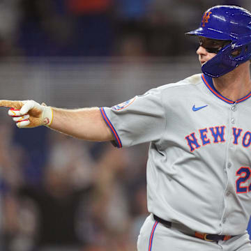 Sep 27, 2025; Miami, Florida, USA; New York Mets first baseman Pete Alonso (20) celebrates his solo home run against the Miami Marlins in the third inning at loanDepot Park. Mandatory Credit: Jim Rassol-Imagn Images