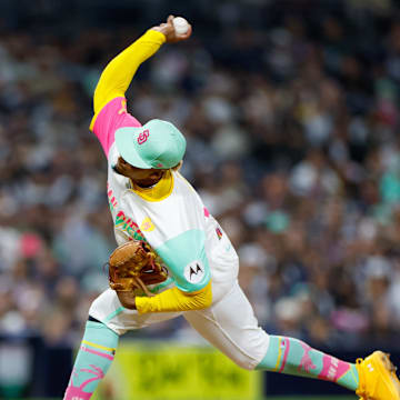 May 24, 2024; San Diego, California, USA;  San Diego Padres relief pitcher Jhony Brito (76) throws a pitch during the seventh inning against the New York Yankees at Petco Park. Mandatory Credit: David Frerker-Imagn Images
