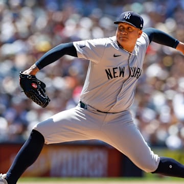 May 26, 2024; San Diego, California, USA; New York Yankees relief pitcher Victor Gonzalez (47) throws a pitch during the sixth inning against the San Diego Padres at Petco Park. Mandatory Credit: David Frerker-Imagn Images