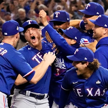 The Texas Rangers celebrate after defeating the Arizona Diamondbacks in Game 5 to become the 2023 World Series champions at Chase Field on Nov 1, 2023.