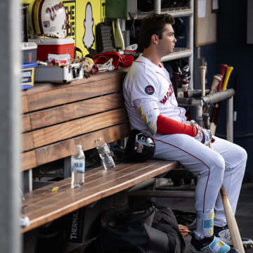Red Sox first baseman Triston Casas sits in the dugout during a rehab start at DH for the WooSox on Tuesday July 30, 2023.