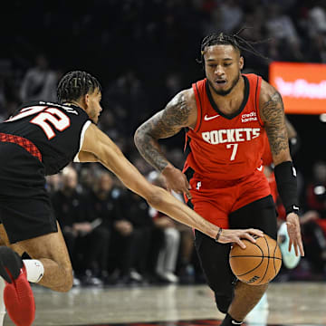 Apr 12, 2024; Portland, Oregon, USA; Portland Trail Blazers guard Rayan Rupert (72) steals the basketball during the first half against Houston Rockets forward Cam Whitmore (7) at Moda Center. Mandatory Credit: Troy Wayrynen-Imagn Images