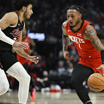 Apr 12, 2024; Portland, Oregon, USA; Houston Rockets forward Cam Whitmore (7) drives to the basket during the first half against Portland Trail Blazers forward Justin Minaya (24) at Moda Center. Mandatory Credit: Troy Wayrynen-Imagn Images