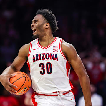 Nov 7, 2025; Tucson, Arizona, USA; Arizona Wildcats forward Tobe Awaka (30) reacts after a foul was called on him during the second half of the game against the Utah Tech Trailblazers at McKale Memorial Center. Mandatory Credit: Aryanna Frank-Imagn Images