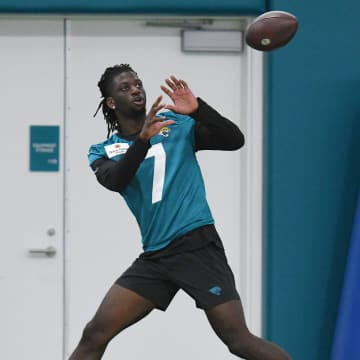 Jacksonville Jaguars wide receiver Brian Thomas (7) pulls in a pass during Friday's rookie minicamp session. The Jacksonville Jaguars held their first day of rookie minicamp inside the covered field at the Jaguars performance facility in Jacksonville, Florida Friday, May 10, 2024. [Bob Self/Florida Times-Union]
