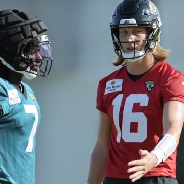 Jacksonville Jaguars wide receiver Brian Thomas Jr. (7) and quarterback Trevor Lawrence (16) talk between drills on the fifth day of the NFL football training camp practice session Monday, July 29, 2024 at EverBank Stadium's Miller Electric Center in Jacksonville, Fla.. [Bob Self/Florida Times-Union]