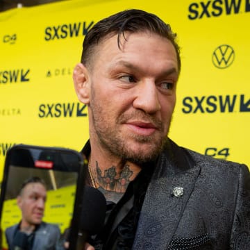 Conor McGregor speaks to press on the red carpet before the premiere of Road House at the Paramount Theatre in Austin, Texas on the first day of South by Southwest, Friday, March 8, 2024. McGregor plays the character \"Knox\" in the movie.