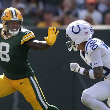 Green Bay Packers running back Josh Jacobs (8) against Indianapolis Colts safety Rodney Thomas II (25) at Lambeau Field on Sunday.