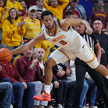 Iowa State Cyclones forward Joshua Jefferson (2) passes the ball around BYU Cougars's guard Egor Demin (3) during the second-over-time game in the Big-12 men’s basketball in the Senior Day at Hilton Coliseum on March 4, 2025, in Ames, Iowa.