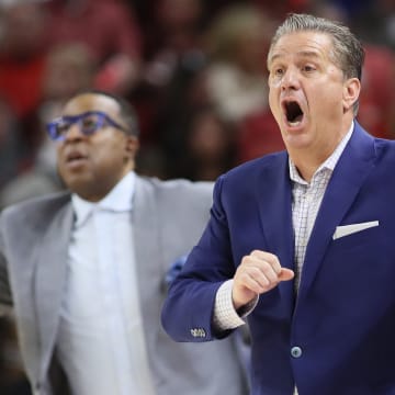 Former Kentucky Wildcats coach John Calipari during the first half against the Arkansas Razorbacks at Bud Walton Arena.