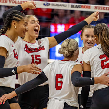 Nebraska players celebrate a point against Ohio State. The Huskers were named the No. 1 overall seed in the NCAA Tournament on Sunday. 