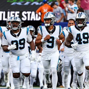 EAST RUTHERFORD, NJ - AUGUST 18: The Carolina Panthers run out onto the field against the New York Giants prior to the game at MetLife Stadium on Friday, August 18, 2023, in East Rutherford, New Jersey.