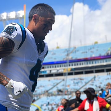 Carolina Panthers wide receiver Tetairoa McMillan (4) runs off the field before an NFL football matchup at EverBank Stadium, Sunday, Sept. 7, 2025 in Jacksonville, Fla.