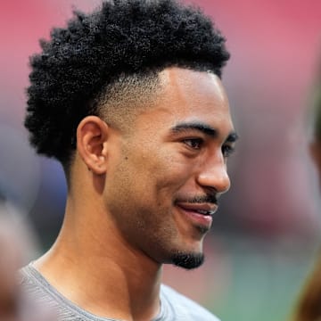 Nov 16, 2025; Atlanta, Georgia, USA; Carolina Panthers quarterback Bryce Young (9) looks on before the game against the Atlanta Falcons at Mercedes-Benz Stadium. 
