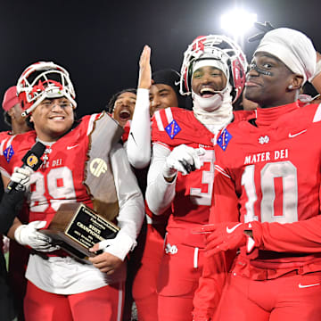 Mater Dei football players are all smiles with the 2024 CIF State Open Division trophy after beating De La Salle 37-15 at Saddleback College. Recently, the school signed a 10-year media rights deal with Playfly Sports with an estimated annual value of $1 million. This package is to help student athletes navigate the NIL landscape and to enhance the already prestigious private high school.