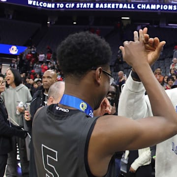 LeBron James celebrates with his son Bryce after Sierra Canyon won the California (CIF) State Division 1 title at Golden 1 Center in Sacramento.