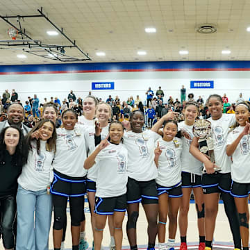 IMG Academy players and coaches pose after winning the 2025 Chipotle Nationals championship game in Indiana.