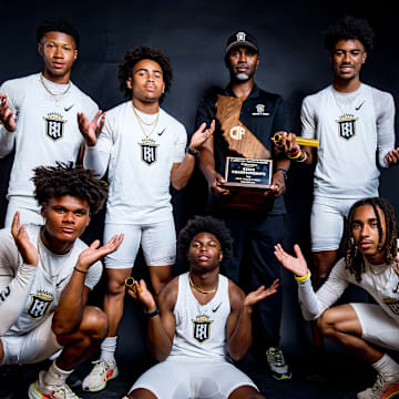 Servite Track athletes pose with CIF state Track and field trophy. These track stars are also key members of Servite's top ranked football squad.