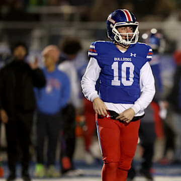 Folsom junior quarterback Brody Rudnicki (10) came off the bench late in the third quarter to replace an injured Ryder Lyons, the Gatorade California Player of the Year and BYU commit. Rudnicki's two touchdown passes and a 50-yard scamper helped the Folsom pull off a wild 42-38 comeback win in the CIF Northern California Division 1-AA championship game at Folsom High School.