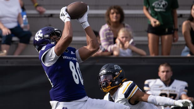 Holy Cross's Jalen Coker hauls in a pass. Photo/Alan Arsenault / USA TODAY NETWORK