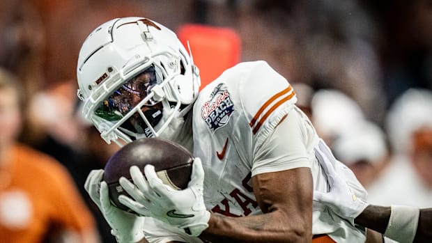 Texas Longhorns wide receiver Matthew Golden catches a long pass for a first down near the end zone in the fourth quarter. 