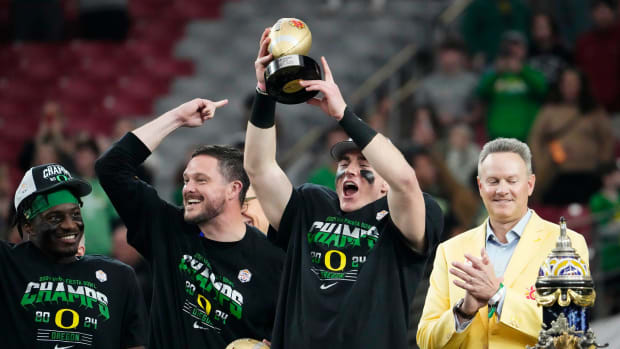 Oregon Ducks quarterback Bo Nix and head coach Dan Lanning 