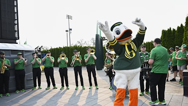 Sep 7, 2024; Eugene, Oregon, USA; The Oregon Ducks mascot dances to the music of the marching band as they welcome the footba