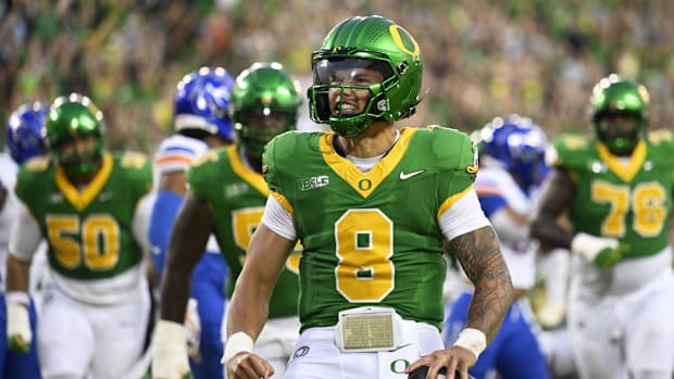 Sep 7, 2024; Eugene, Oregon, USA; Oregon Ducks quarterback Dillon Gabriel (8) celebrates after scoring a touchdown during the