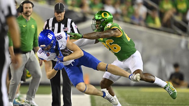 Sep 7, 2024; Eugene, Oregon, USA; Boise St. Broncos wide receiver Austin Bolt (81) tackled by Ducks linebacker Devon Jackson.