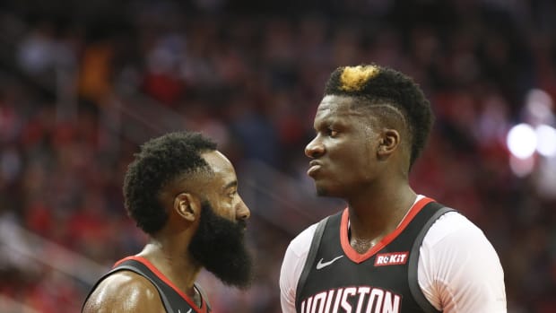 Nov 18, 2019; Houston, TX, USA; Houston Rockets guard James Harden (13) talks to center Clint Capela (15) while playing against the Portland Trail Blazers in the second quarter at Toyota Center. Mandatory Credit: Thomas B. Shea-USA TODAY Sports