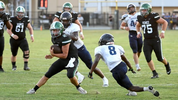 New starting quarterback Jayce Nixon fumbles the ball as Naples recovers. 