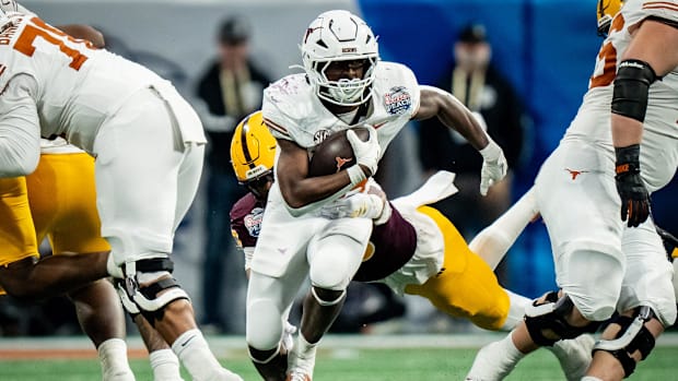 Texas Longhorns running back Quintrevion Wisner (26) carries the ball in the fourth quarter vs. Arizona State